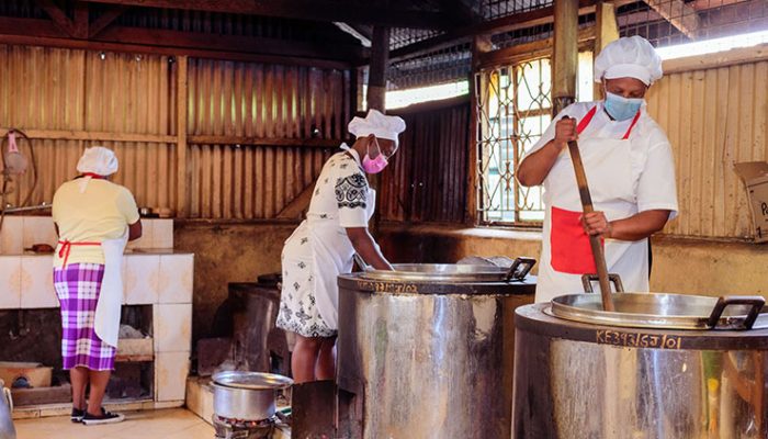 Joy spring School cooks prepare lunch meals for students